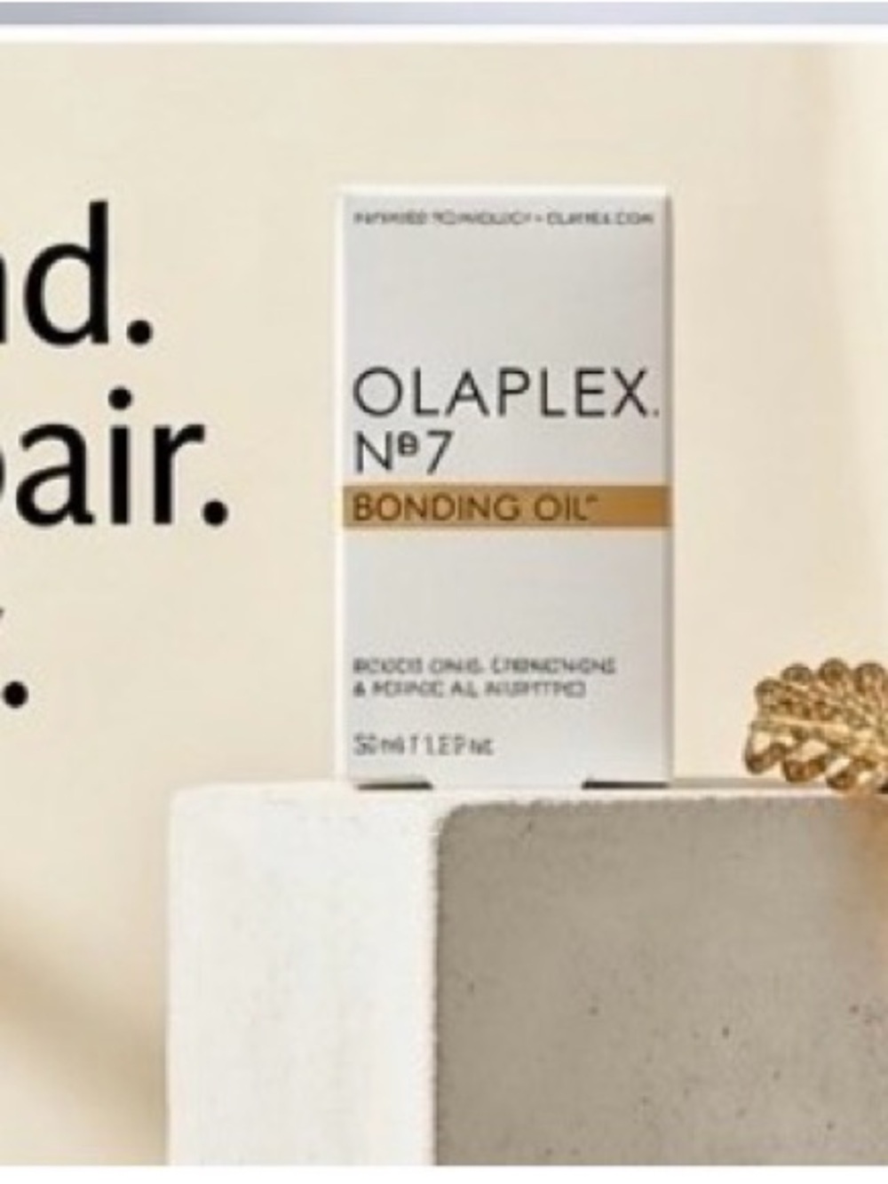 OLAPLEX No.7 Bonding Oil - White and Gold Accents
